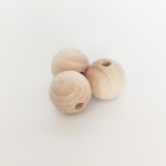Korálky dřevěné kulaté velkoprůvlekové – Zboží Mobilmania