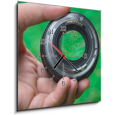 Obraz s hodinami 1D - 50 x 50 cm - Mobile lenses on a green lawn. Mobilní čočky na zeleném trávníku. – Zboží Mobilmania