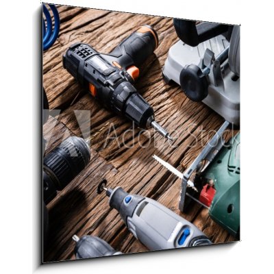 Obraz 1D - 50 x 50 cm - Power Tools On Wooden Desk Elektrické nářadí na dřevěném stole – Hledejceny.cz