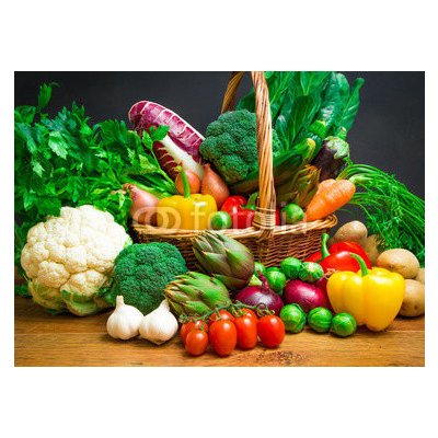 WEBLUX 61518085 Fototapeta vliesová Raw vegetables in wicker basket on wooden table Surové zeleniny v proutěném koši na dřevěném stole rozměry 200 x 144 cm