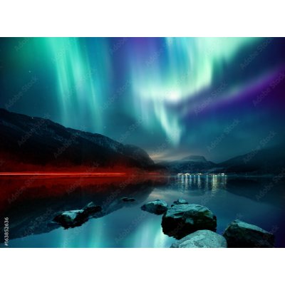 WEBLUX Fototapeta vliesová A large Northern Lights (aurora borealis) display glowing over a mountain pass and reflected on a lake at night. Photo composition. - 163852636 270 x 200 cm – Hledejceny.cz