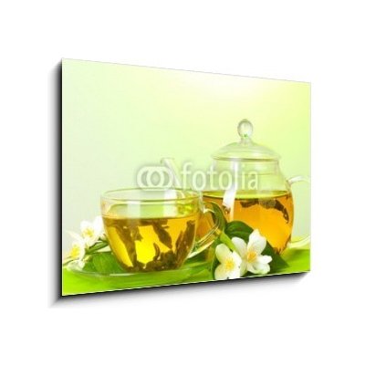 Obraz 1D - 100 x 70 cm - tea with jasmine in cup and teapot on table on green background čaj s jasmínem v šálku a čajová konvice na stole na zeleném pozadí – Zbozi.Blesk.cz