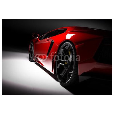 WEBLUX 115248334 Fototapeta plátno Red fast sports car in spotlight Červené rychlé sportovní auto v reflektoru černé pozadí. Lesklý nový luxusní. rozměry 174 x 120 cm – Zboží Mobilmania