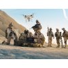 Tapety WEBLUX 164038449 Fototapeta vliesová Soldiers are Using Drone for Scouting During Military Operation in the Desert. Vojáci používají dron ke skautingu během vojenské op rozměry 270 x 200 cm