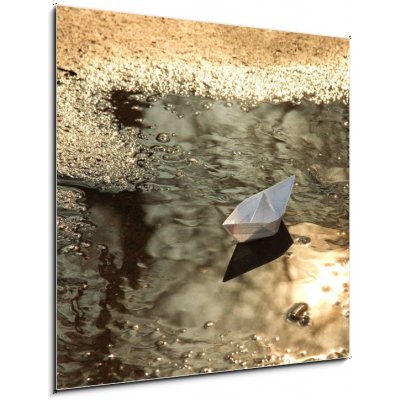 Obraz 1D - 50 x 50 cm - paper ship floats in a spring pool papírová loď pluje v jarním bazénu – Zboží Mobilmania