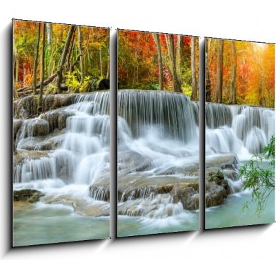 Obraz 3D třídílný - 105 x 70 cm - Colorful majestic waterfall in national park forest during autumn, panorama