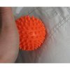Masážní pomůcka Modom masážní míček ježek oranžový 7 cm