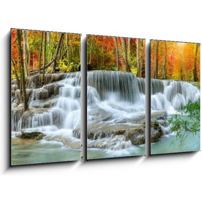 Obraz 3D třídílný - 90 x 50 cm - Colorful majestic waterfall in national park forest during autumn, panorama
