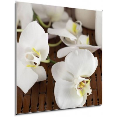 Obraz 1D - 50 x 50 cm - Face cream and white orchid on a bamboo mate Krém na obličej a bílá orchidej na bambusové kamarádce – Zboží Mobilmania
