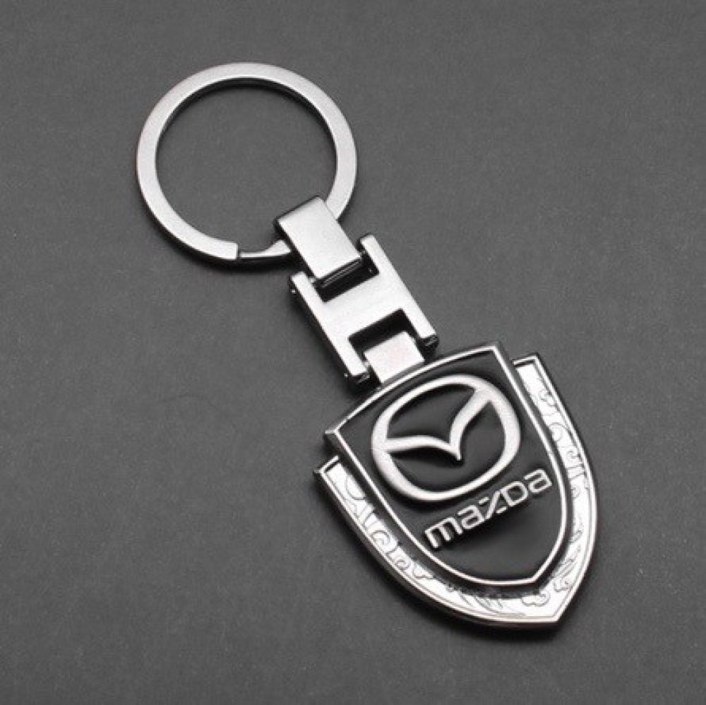Přívěsek na klíče Mazda ve tvaru erbu elegantní | Srovnanicen.cz