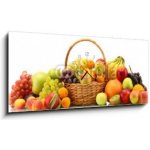 Obraz s hodinami 1D panorama - 120 x 50 cm - Assortment of exotic fruits in basket isolated on white Sortiment exotických ovoce v koši izolovaných na bílém – Sleviste.cz