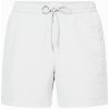 Koupací šortky, boardshorts Calvin Klein pánské koupací kraťasy KM00718 YCD bílé