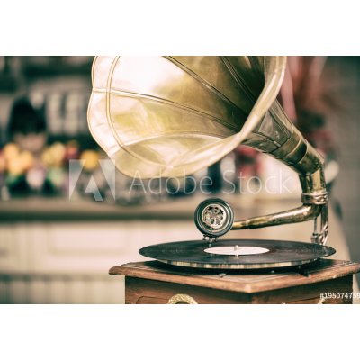 WEBLUX 195074759 Fototapeta vliesová Retro old gramophone radio. Vintage style toned photo Retro staré gramofonové rádio. Fotografie ve stylu vintage stylu rozměry 145 x 100 cm – Zbozi.Blesk.cz