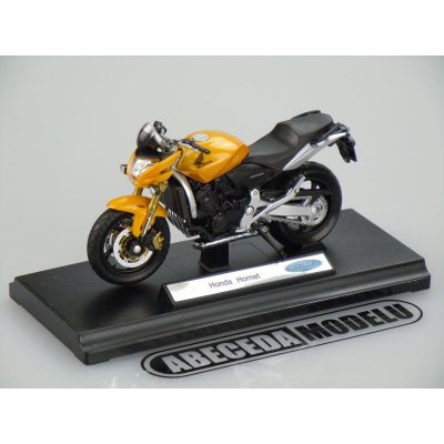 Welly Hornet Motocykl Honda model žlutý 1:18 – Zboží Mobilmania