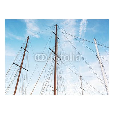 WEBLUX 166856176 Fototapeta vliesová Masts of sailboat and blue sky Stožáry plachetnice a modré oblohy rozměry 100 x 73 cm – Zboží Mobilmania