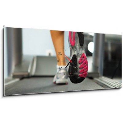 Obraz s hodinami 1D panorama - 120 x 50 cm - Running on treadmill Běh na běžícím pásu – Sleviste.cz