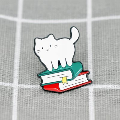 Pinarna Bílá kočička na knížkách – Sleviste.cz