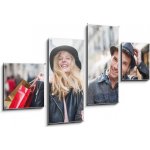 Obraz 4D čtyřdílný - 100 x 60 cm - a trendy young couple wearing hats walking in the city in autum módní mladý pár nosí klobouky chůzi ve městě v podzimní – Hledejceny.cz