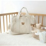 MOMMY BAG světle béžová praktická taška – Sleviste.cz