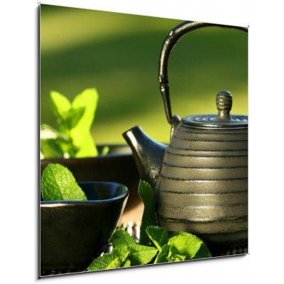 Obraz 1D - 50 x 50 cm - Black iron asian teapot with sprigs of mint for tea Černá železná asijská čajová konvice s větvičkami na čaj – Zboží Mobilmania