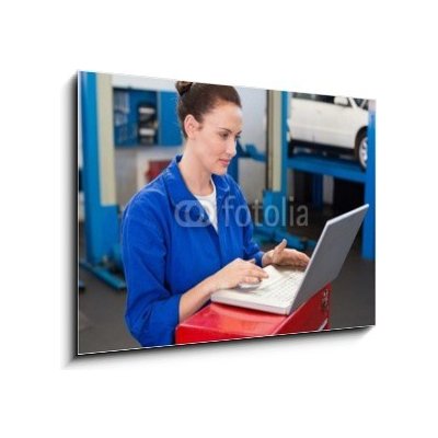 Obraz 1D - 100 x 70 cm - Mechanic working on a laptop Mechanik pracující na přenosném počítači – Zboží Mobilmania