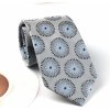 Kravata Hedvábná kravata světle šedá s modrým dekorem