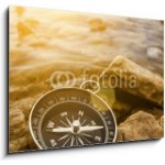 Skleněný obraz 1D - 100 x 70 cm - compass on the shore at sunrise kompas na pobřeží při východu slunce