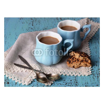 WEBLUX 71101894 Fototapeta plátno Cups of coffee with cookies and napkin on wooden table Šálek kávy s cookies a ubrousek na dřevěném stole rozměry 160 x 116 cm – Zboží Mobilmania