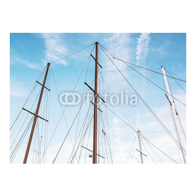 WEBLUX 166856176 Fototapeta vliesová Masts of sailboat and blue sky Stožáry plachetnice a modré oblohy rozměry 270 x 200 cm – Zboží Mobilmania