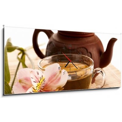 Obraz s hodinami 1D panorama - 120 x 50 cm - Cup of green tea on the table with orchid flower Šálek zeleného čaje na stole s květinou orchideje – Zboží Mobilmania