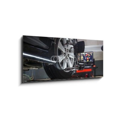 Skleněný obraz 1D panorama - 120 x 50 cm - Car on stand with sensors on wheels for wheels alignment camber Automobil na stojanu se senzory na kolečkách pro vychycení kol – Zboží Mobilmania