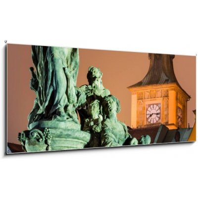 Skleněný obraz 1D panorama - 120 x 50 cm - Saint Ivo statue and Smetana clock-tower, Prague. Socha svatého Iva a hodiny Smetany – Zbozi.Blesk.cz