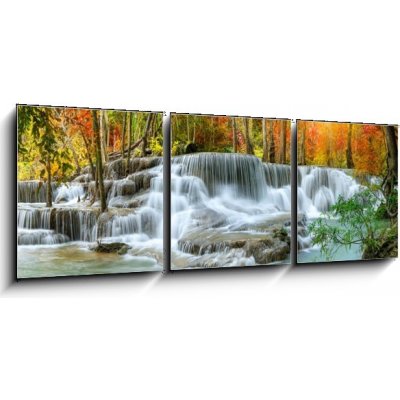 Obraz 3D třídílný - 150 x 50 cm - Colorful majestic waterfall in national park forest during autumn, panorama