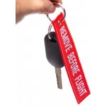 Přívěsek na klíče remove before flight červená menší – Zboží Mobilmania