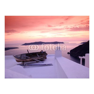 WEBLUX 41448704 Samolepka fólie Santorini with boat on white roof against sunset in Greece Santorini s lodí na bílé střeše proti západu slunce v Řecku rozměry 270 x 200 cm – Zboží Mobilmania