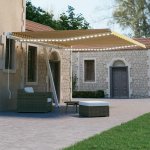 VidaXL Ručně zatahovací markýza s LED světlem 450 x 300 cm žlutobílá – Zboží Mobilmania