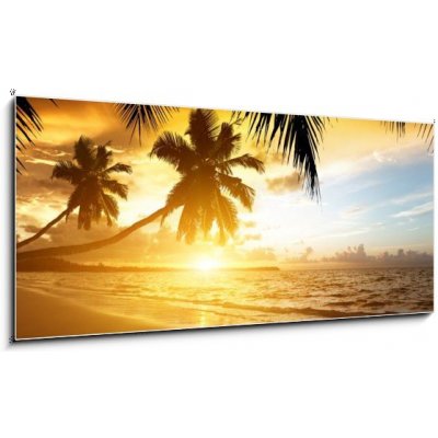 Obraz 1D panorama - 120 x 50 cm - sunset on the beach of caribbean sea západ slunce na pláži karibského moře – Sleviste.cz