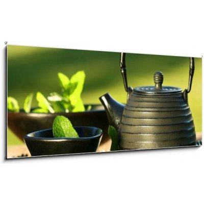 Obraz 1D panorama - 120 x 50 cm - Black iron asian teapot with sprigs of mint for tea Černá železná asijská čajová konvice s větvičkami na čaj – Zboží Mobilmania