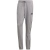 Pánské tepláky adidas Essentials Tapered Elastic Cuff 3 Stripes Pant M GK9001