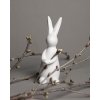 Velikonoční dekorace Storefactory Keramický králík s tlapkami na větvičky Ida White