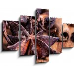 Obraz 5D pětidílný - 150 x 100 cm - close up of star anise on wooden plank, slective focus zblízka badyánu na dřevěné prkno, slective zaměření – Zbozi.Blesk.cz