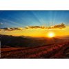 Tapety WEBLUX Fototapeta papír Beautiful sun set with sweet clouds between mountains - 569569643 184 x 128 cm