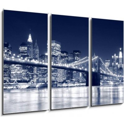 Obraz 3D třídílný - 105 x 70 cm - Brooklyn Bridge and Manhattan skyline At Night, New York City Brooklynský most a Manhattan skyline V noci, New York City