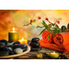 WEBLUX Fototapeta vliesová preparation for massage in orange lights and black stones - 59390339 příprava na masáž v oranžových světlech a černém kameni, 200 x 144 cm