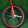 TRAINER Standard jednokolka 20" (Indy) unicycle pro začátečníky Barva: Červená