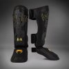 Chrániče holení Venum Serpenti - Black/Silver/Gold Velikost: XL