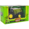 kovový kombajn – hračka s pohyblivými prvkami