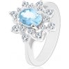 Šperky eshop - Prsteň v striebornej farbe, svetlomodrý oválny zirkón, číre zirkónové lupene G04.17 - Veľkosť: 54 mm