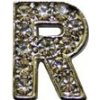 Ozdobné písmeno R na čelenku HKM