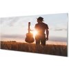 Sklenený obklad do kuchyne gitara muž 100x50 cm